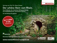 Im Vordergrund ist eine antike Mauer mit einer kaminartigen Öffnung. Drumherum sind Bäume.